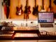 Home Recording Studio with Guitars, Laptop, Midi Controller and Mixer
