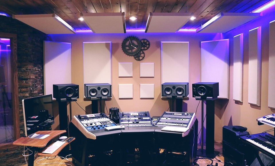 clean studio with monitors on stands