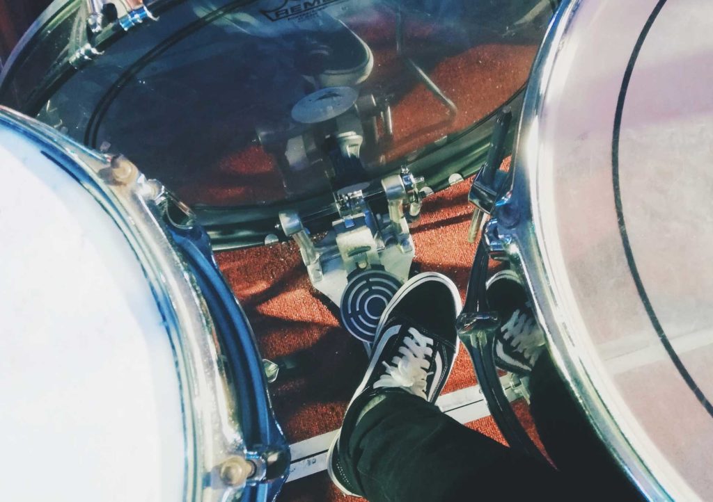 drummer with foot of kick drum pedal