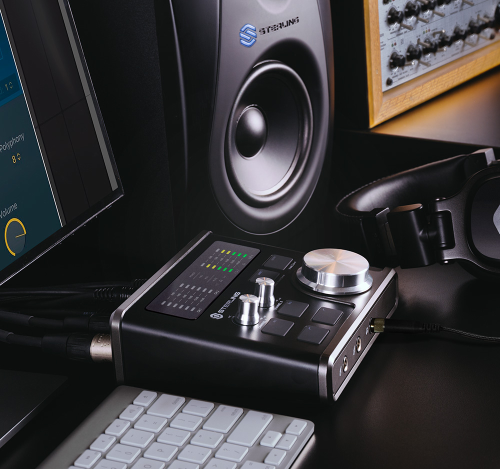 Image of Sterling H224 Audio Interface in a small home studio setting