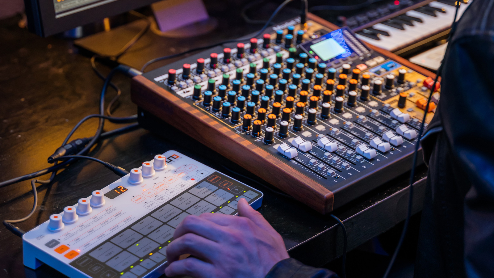 TASCAM Model 12 in use with touchpads and connected to a computer